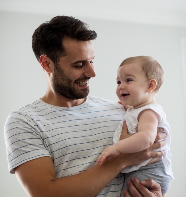 Father holding his baby girl